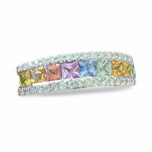 18k white gold rainbow and diamond sapphire channel set half eternity ring